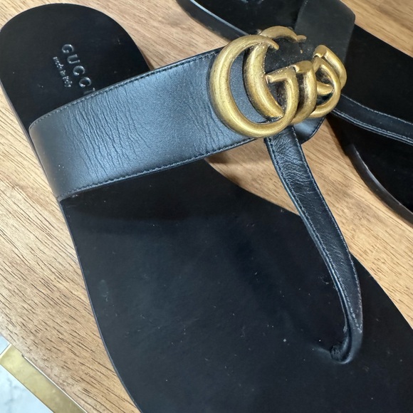 Gucci Black Sandals with Gold Emblem and Thin Straps - Picture 9 of 10